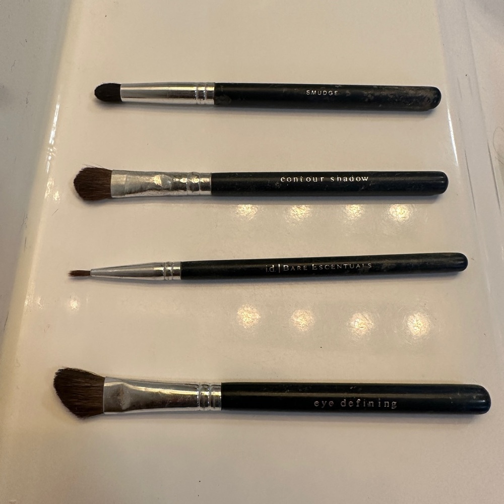 Set of four (4) bareMinerals / i.d. Bare Escentuals eye shadow brushes.